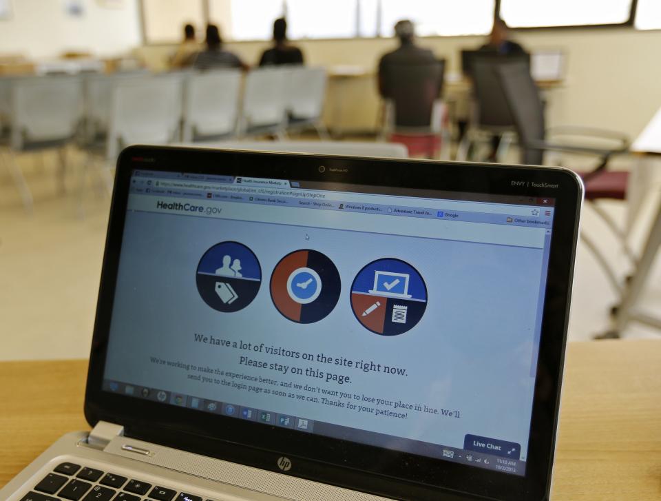 A busy screen is shown on the laptop of a Certified Application Counselor as he attempted to enroll an interested person for Affordable Care Act insurance in Miami