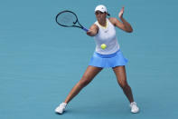 Madison Keys hits a return to Diana Shnaider, of Russia, during the Miami Open tennis tournament, Thursday, March 21, 2024, in Miami Gardens, Fla. (AP Photo/Lynne Sladky)