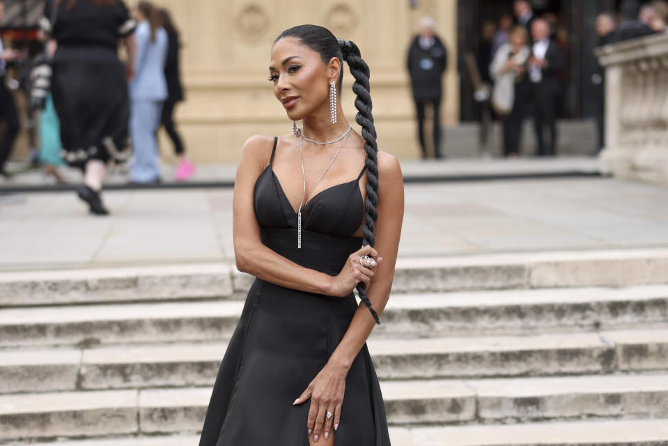 Nicole Scherzinger poses for photographers upon arrival at the Olivier Awards on Sunday, April 14, 2024, in London. (Photo by Vianney Le Caer/Invision/AP)