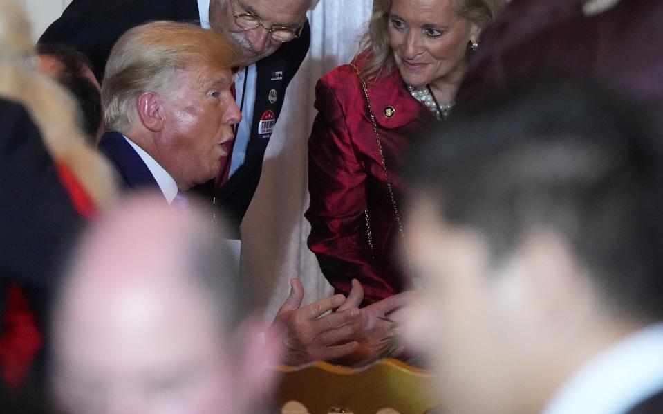 Former president Donald Trump greets supporters in the ballroom during an election watch party at Mar-a-Lago in Palm Beach, FL. Tuesday, Nov. 8, 2022. [JIM RASSOL/palmbeachpost.com