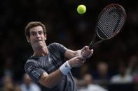 Andy Murray of Britain returns a shot during his men's singles tennis match against Grigor Dimitrov of Bulgaria in the third round of the Paris Masters tennis tournament at the Bercy sports hall in Paris, October 30, 2014. REUTERS/Benoit Tessier