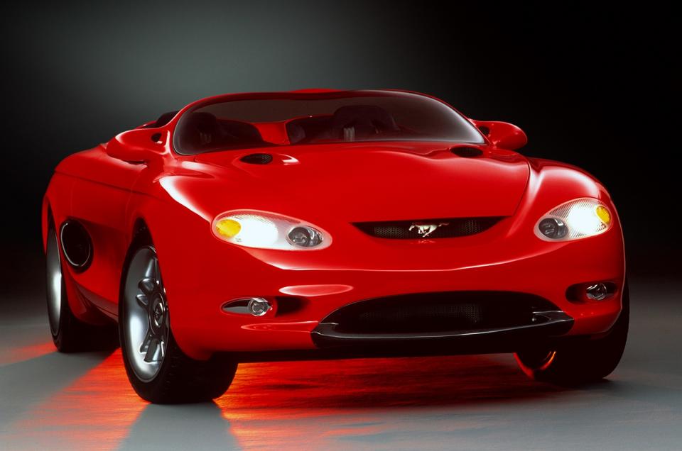<p>Ford nearly re-invented the Mustang on a <strong>front-wheel drive platform</strong> borrowed from Mazda. When enthusiasts protested, the firm started working on a proper, rear-wheel drive replacement for the third-generation car. It previewed the first all-new Mustang since 1978 with a concept car called Mach III shown in <strong>January 1993</strong> at the Detroit and Los Angeles auto shows.</p><p>Ford allegedly chose the venue to <strong>steal GM’s thunder</strong>; the then-new Pontiac Firebird and Chevrolet Camaro were among the shows’ stars.</p>