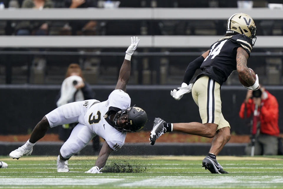 Vanderbilt wide receiver Will Sheppard (14) gets past Wake Forest defensive back Malik Mustapha (3) in the second half of an NCAA college football game Saturday, Sept. 10, 2022, in Nashville, Tenn. (AP Photo/Mark Humphrey)
