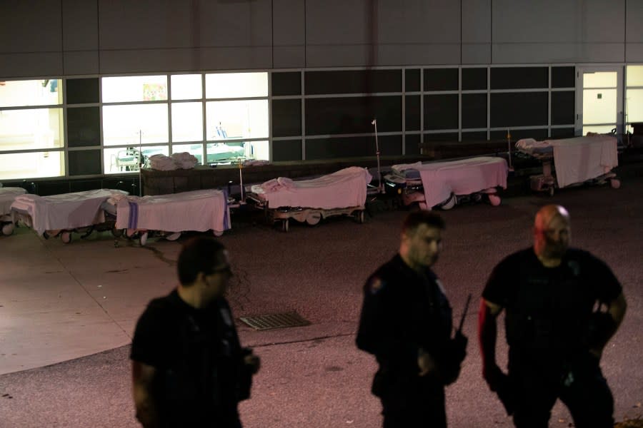 Stretchers are lined up outside the emergency room at Central Maine Medical Center following shootings in Lewiston, Maine, Wednesday, Oct. 25, 2023. (Derek Davis/Portland Press Herald via AP)