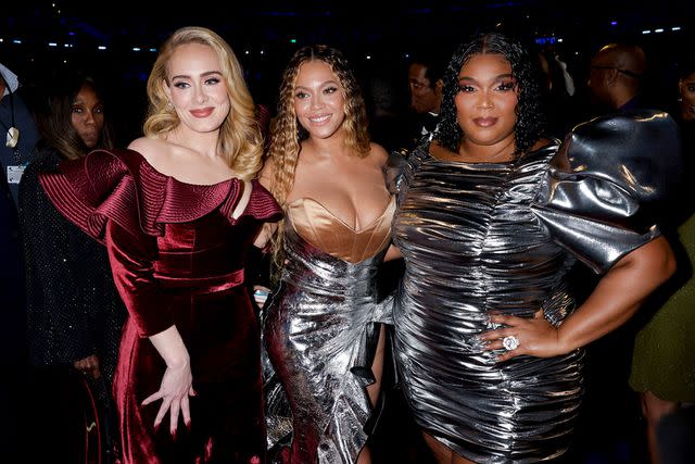 <p>Francis Specker/CBS via Getty </p> Adele, Beyoncé and Lizzo at the Grammys in Los Angeles in February 2023