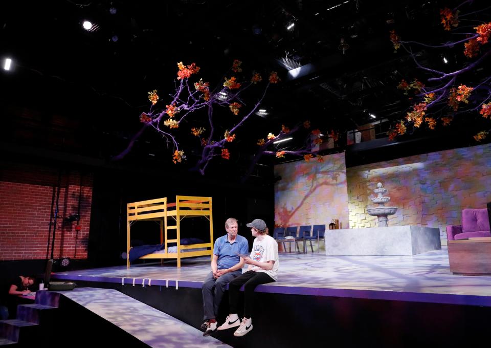 Logan Corley, right, and Dirk Lumbard run through a scene during a rehearsal for "King of Pangaea" at Lyric Theatre in Oklahoma City, Thursday, March 7, 2024.