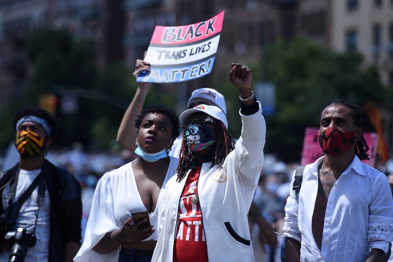 FILE PHOTO: People participate in a Black Trans Lives Matter rally