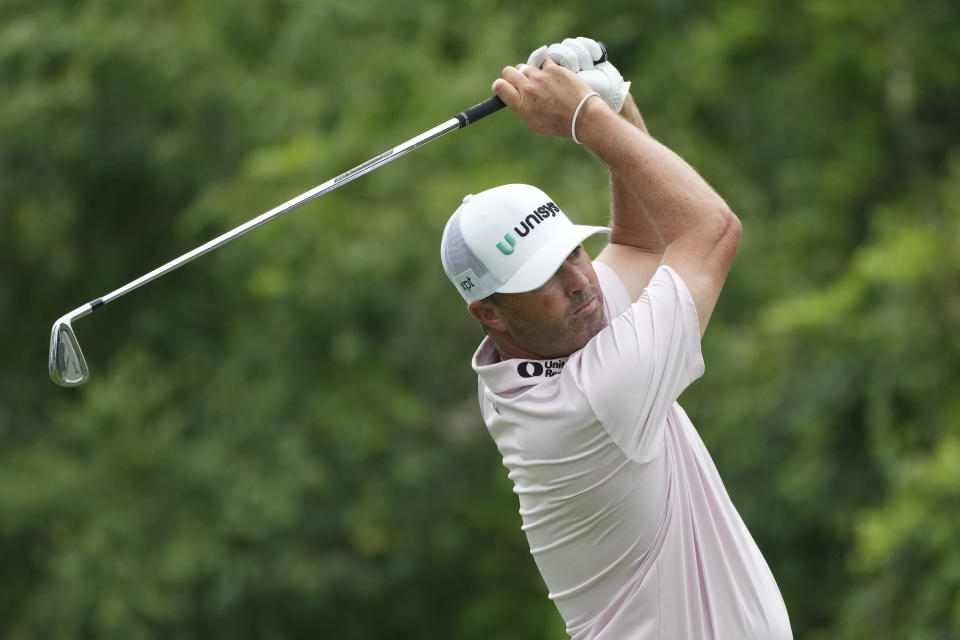 Ryan Palmer hits off the eighth tee during the third round of the Rocket Mortgage Classic golf tournament at Detroit Country Club, Saturday, July 1, 2023, in Detroit. (AP Photo/Carlos Osorio)