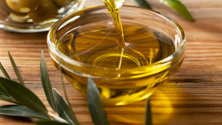 olive oil poured into bowl