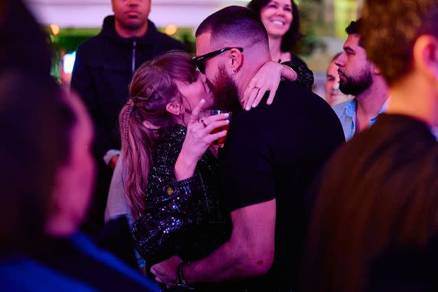 <p>Mike Kirschbaum</p> Taylor Swift and Travis Kelce Share Celebratory Kiss inside DJ Booth at XS Nightclub inside Wynn Las Vegas on Feb. 11