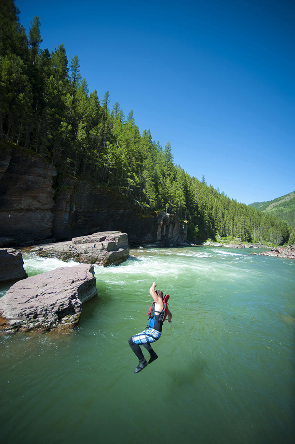 <p>Going for a swim in the Middle Fork of the Flathead River. (Photo: Lee Cohen) </p>