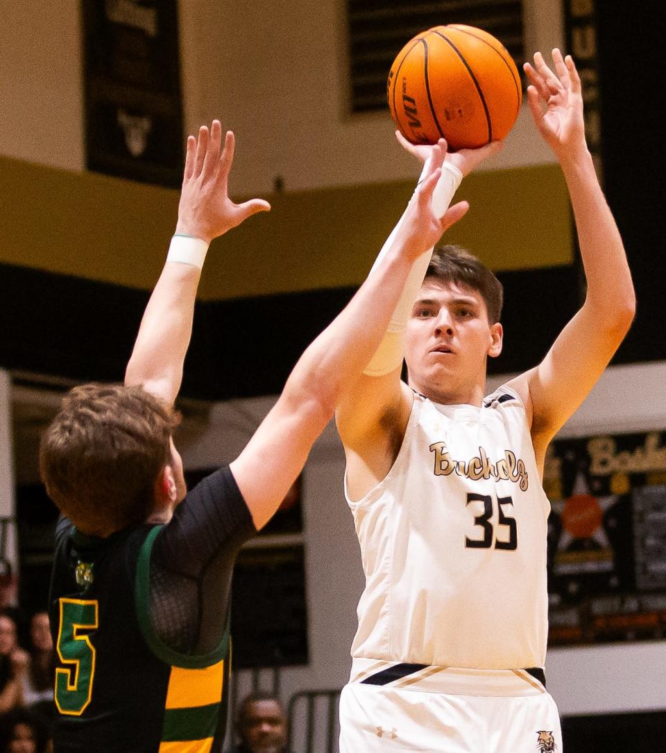 Buchholz Bobcats forward Palmer Walton (35) shoots for three in the fist half. Buchholz High School hosted the Forest Wildcats at Buchholz High School in Gainesville, FL on Thursday, February 15, 2024 in the Class 6A-Region 1 Quarterfinals. The Bobcats defeated the Wildcats 59-48. [Doug Engle/Gainesville Sun]