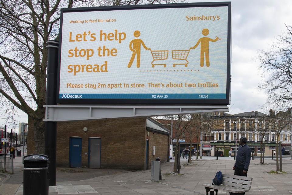 A billboard by Sainsbury's supermarket advicing customers to social distance while shopping on display in London, UK on April 2, 2020. The Coronavirus (COVID-19) pandemic has spread to many countries across the world, claiming over 40,000 lives and infecting hundreds of thousands more. (Photo by Claire Doherty/Sipa USA)