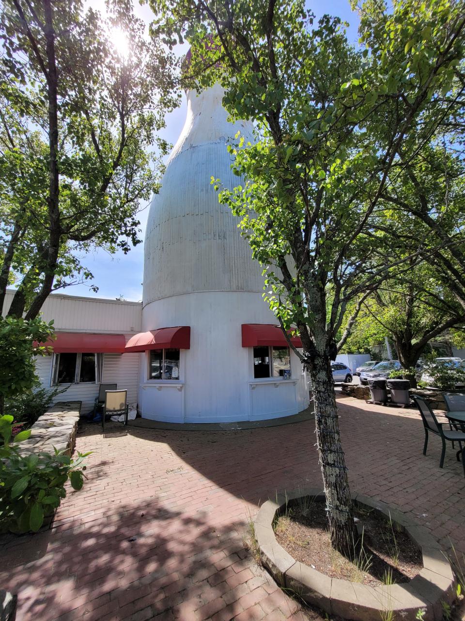 The Milk Bottle in Raynham has a shaded patio where customers can eat outside.