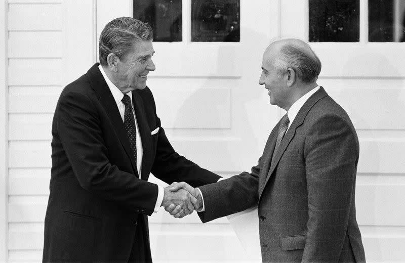 FILE PHOTO: U.S. President Ronald Reagan and Soviet President Mikhail Gorbachev shake hands after their mini-summit meeting in Reykjavik