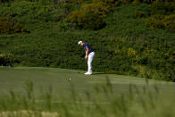 Cameron Smith putts on the 11th green during the second round of the Tournament of Champions golf event, Friday, Jan. 7, 2022, at Kapalua Plantation Course in Kapalua, Hawaii. (AP Photo/Matt York)