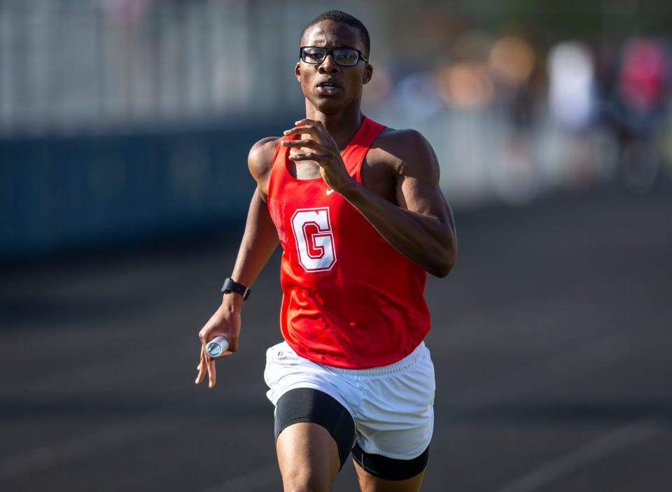 Glenwood’s Samson Dessalines brings home the victory on the final lap of the 4x800-meter relay at the boys Central State Eight Track & Field Meet last season at Memorial Stadium in Springfield.