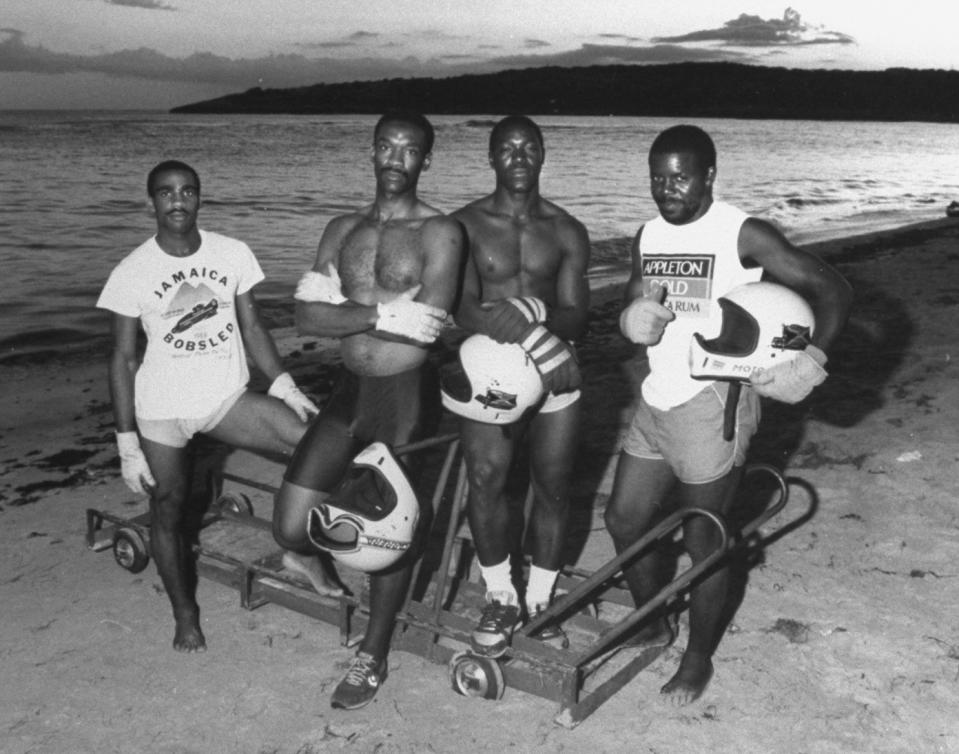 Image: Jamaican Bobsled team, from left, Michael White, Dudley Stokes, Devon Harris and Frederick Powell. (Will & Deni McIntyre / Getty Images)