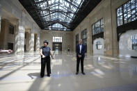 Michigan Central Station Head of Place Melissa Dittmer, left, and CEO Josh Sirefman give a tour of the train station, Monday, May 13, 2024 in Detroit. A once hulking scavenger-ravaged monolith that symbolized Detroit's decline reopens this week after a massive six-year multimillion dollar renovation by Ford Motor Co., which restored the Michigan Central Station to its past grandeur with a focus squarely on the future of mobility. (AP Photo/Carlos Osorio)