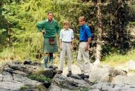 <p>Prince Harry and Prince William explore the banks of the River Dee at Balmoral Castle with father, Prince Charles. </p>