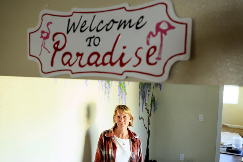 Heidi Lange stands inside her Paradise, Calif., home, Thursday, Oct. 26, 2023. Lange, who rebuilt following the Camp Fire, is facing a homeowners insurance quote that jumped from $1,191 to $9,754. (AP Photo/Noah Berger)