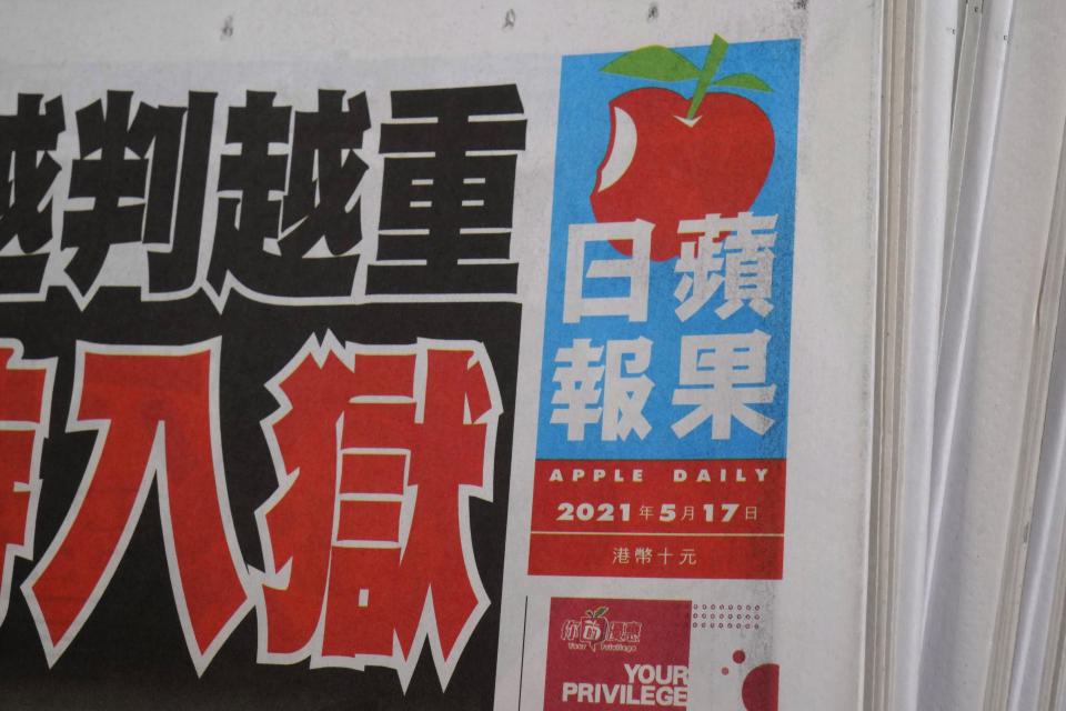 Copies of Apple Daily newspaper are displayed for sale at a newsstand in Hong Kong, Monday, May 17, 2021. The Hong Kong stock exchange on Monday halted the trading of Next Digital shares, days after authorities froze assets belonging to its founder Jimmy Lai. Next Digital said in a filing that it requested the halt after authorities announced that it had frozen Lai’s assets Friday. Next Digital publishes pro-democracy tabloid Apple Daily, and the company was founded by Lai, its controlling shareholder. (AP Photo/Kin Cheung)