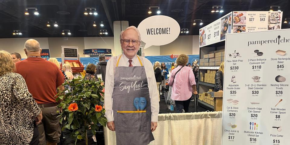 A Warren Buffett cutout in front of Pampered Chef's booth.