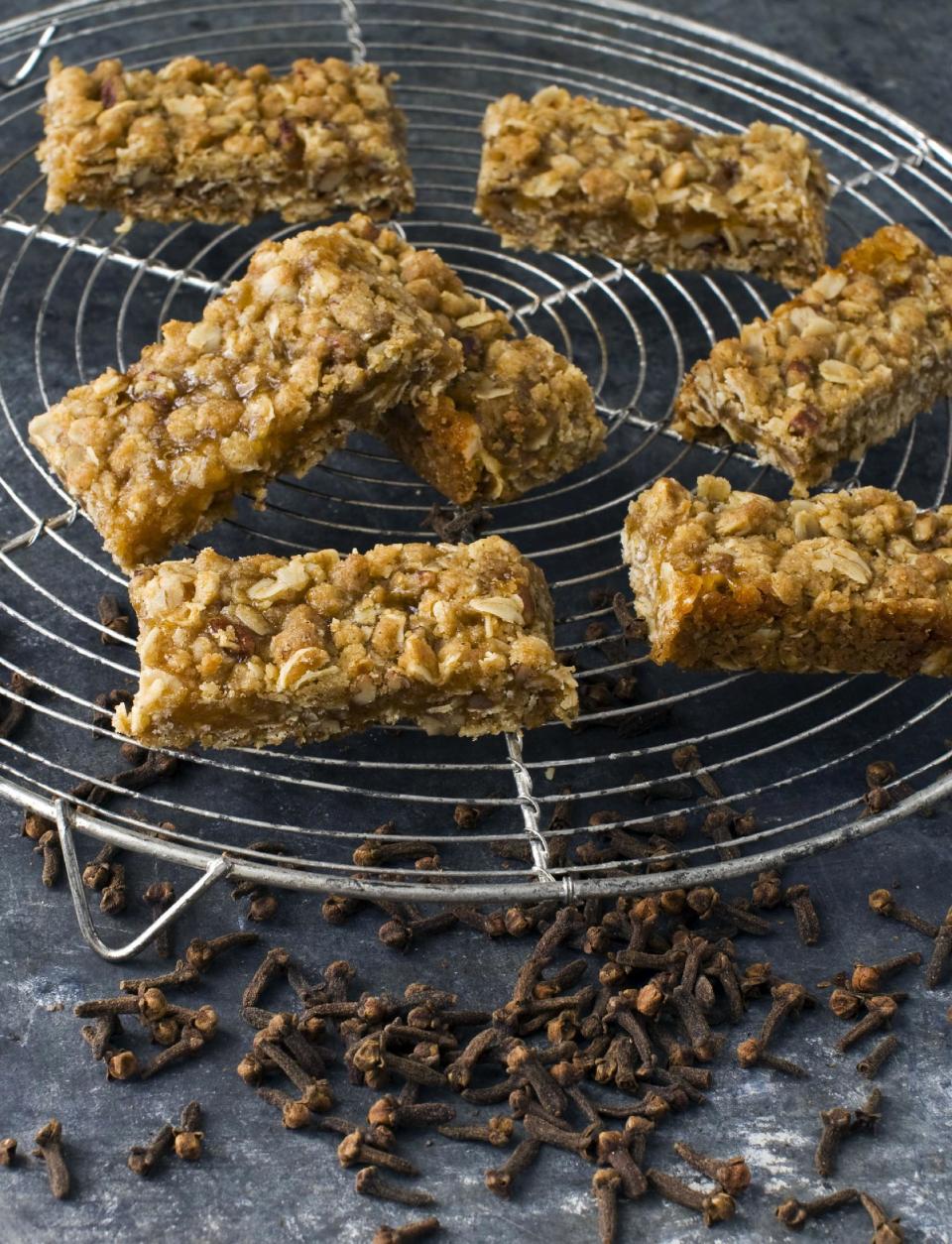 In this image taken on Monday, Nov. 5, 2012, apricot clove crumb bars are shown in Concord, N.H. (AP Photo/Matthew Mead)