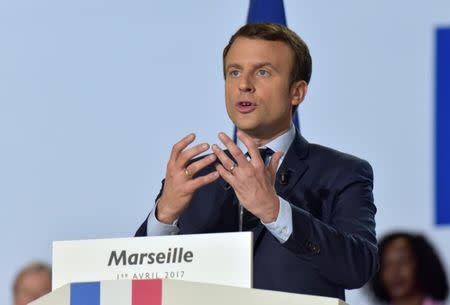 Emmanuel Macron, head of the political movement En Marche !, or Onwards !, and candidate for the 2017 French presidential election, attends a campaign rally in Marseille, France, April 1, 2017. REUTERS/Philippe Laurenson