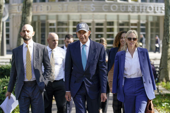 Tom Barrack, center, leaves Brooklyn Federal Court, Wednesday, Nov. 2, 2022, in the Brooklyn borough of New York. Barrack, the onetime chair of the Trump's inaugural committee, is accused of using his “unique access” as a longtime friend of Trump to manipulate Trump's campaign — and later his Republican administration — to advance the interests of the UAE. (AP Photo/Julia Nikhinson)