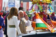 India's Prime Minister Narendra Modi (R) speaks with US President Donald Trump (C) and First Lady Melania Trump (L) upon their arrival at Sardar Vallabhbhai Patel International Airport in Ahmedabad on February 24, 2020. (Photo by Mandel NGAN / AFP) (Photo by MANDEL NGAN/AFP via Getty Images)