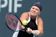 Diana Shnaider, of Russia, hits a return to Madison Keys during the Miami Open tennis tournament, Thursday, March 21, 2024, in Miami Gardens, Fla. (AP Photo/Lynne Sladky)