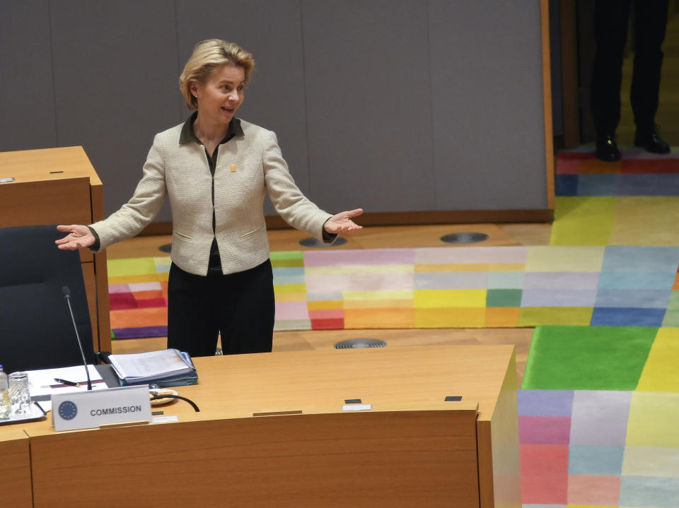 European Commission President Ursula von der Leyen gestures as she arrives for a round table meeting of EU leaders at an EU summit in Brussels, Thursday, Feb. 20, 2020. After almost two years of sparring, the EU will be discussing the bloc's budget to work out Europe's spending plans for the next seven years. (AP Photo/Riccardo Pareggiani, Pool)