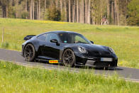 <p>Since unveiling the Porsche 911 Targa 4S Heritage Design in 2020, Porsche have gone on to add the 911 Sport Classic to the Heritage Design model line-up. The newest model to join the line-up imminently is the 911 ST. Inspired by the 1970s version of the 911 that went racing, the 2023 Porsche 911 ST has been seen testing is a lightweight version Porsche 911 GT3 Touring, released as part of the 911’s 60th birthday celebrations.</p><p>Visible differences to the GT3 Touring are the double-bubble roof and the panel that is incorporated into the bodywork behind the front wheels. The rear spoiler also features an extended lip, and the mesh engine cover can be seen wearing the heritage design plaque like on the 911 Sport Classic.</p>