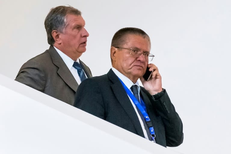 Rosneft CEO Igor Sechin (L) and Russian Economy Minister Alexei Ulyukayev attend a meeting in Baku, Azerbaijan on August 8, 2016