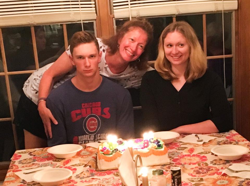 From left, Jakob, Greta, and Emma Mumper celebrate with cake. On Sept. 6, 2020, Jakob, his mother Greta, and sister Emma, were murdered by husband and father, Jeffrey Mumper, in a form of domestic violence experts call family annihilation. 