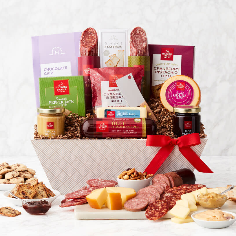 <p><a href="https://go.redirectingat.com?id=74968X1596630&url=https%3A%2F%2Fwww.hickoryfarms.com%2Fgift-baskets%2Fdeluxe-gourmet-charcuterie-gift-basket-006447.html%3Fgridindex%3D4%26cgid%3Dgift-baskets%23start%3D1&sref=https%3A%2F%2Fwww.thepioneerwoman.com%2Ffood-cooking%2Fg38290860%2Fchristmas-gift-baskets%2F" rel="nofollow noopener" target="_blank" data-ylk="slk:Shop Now;elm:context_link;itc:0;sec:content-canvas" class="link rapid-noclick-resp">Shop Now</a></p><p>Deluxe Gourmet Charcuterie Gift Basket</p><p>hickoryfarms.com</p><p>$99.99</p><span class="copyright">Hickory Farms </span>