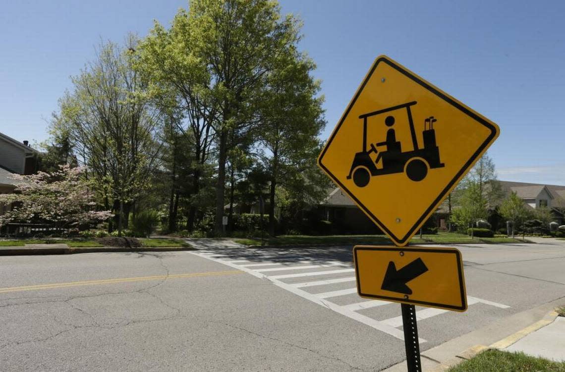 A golf cart crossing sign near the former Andover Golf and Country Club in Lexington.