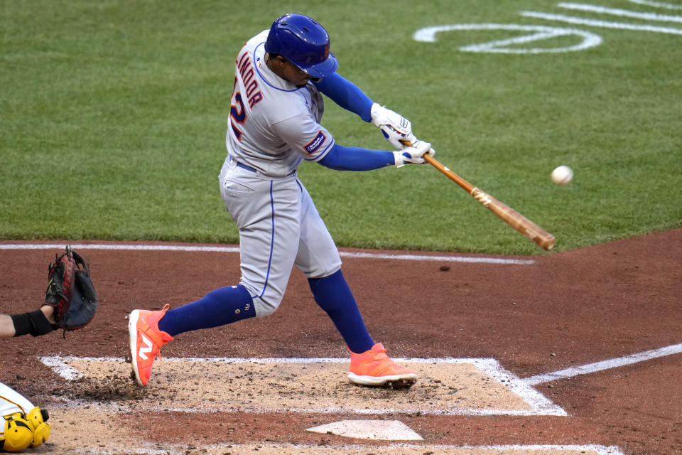 New York Mets' Francisco Lindor hits a solo home run off Pittsburgh Pirates starting pitcher Rich Hill during the third inning of a baseball game in Pittsburgh, Friday, June 9, 2023. (AP Photo/Gene J. Puskar)