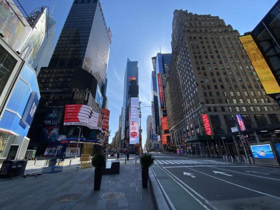 New York’s Times Square in the middle of the day during the coronavirus outbreak. (Richard Hall / The Independent )