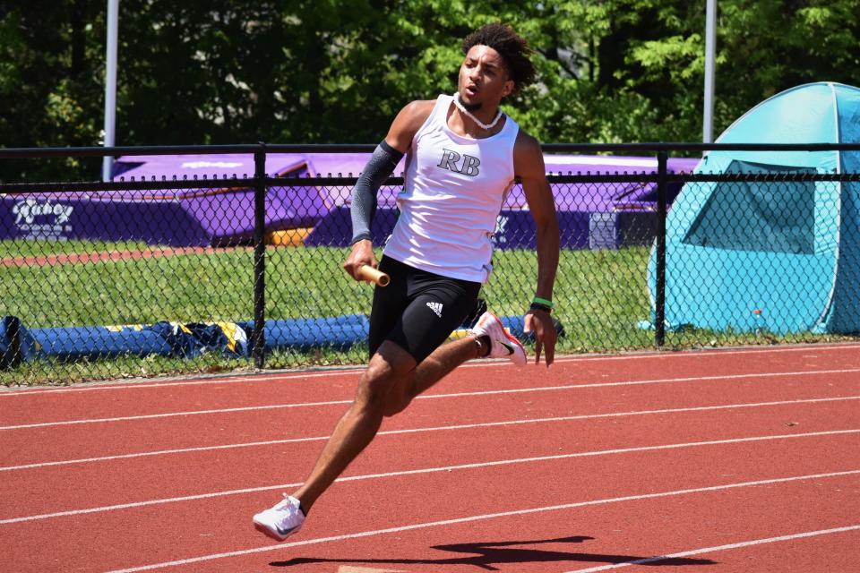 Rock Bridge's Chris Giles set a new Class 5 record in the 100-meter dash, earning the state title with a finish of 10.46 seconds.