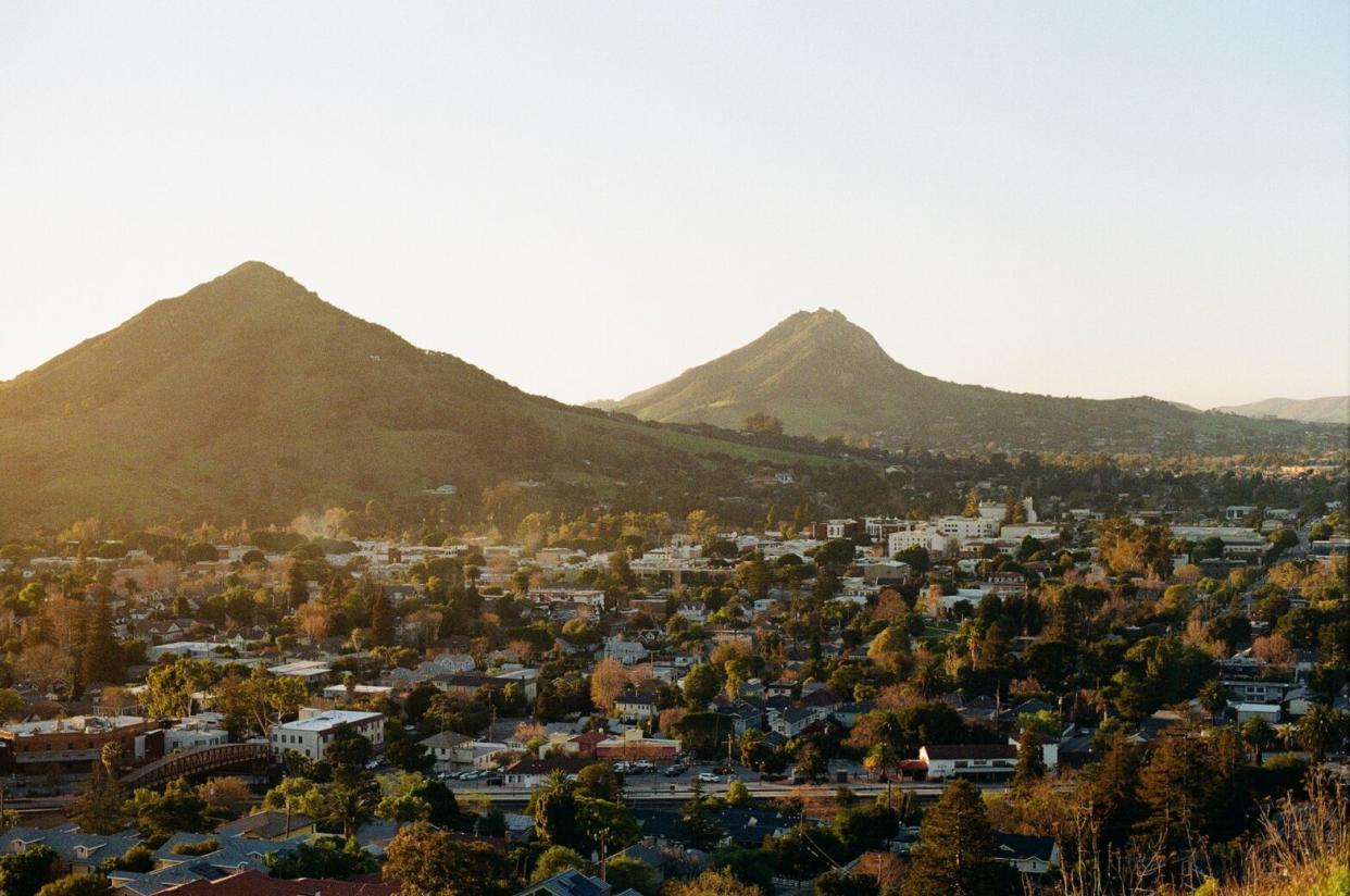 These top 10 things to do in San Luis Obispo make now the best time to consider visiting. Pictured: an overlook of the city of San Luis Obispo at sunset.