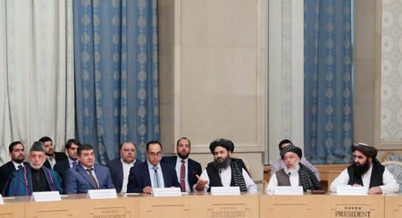 Officials attend peace talks between Afghan senior politicians and a Taliban delegation in Moscow