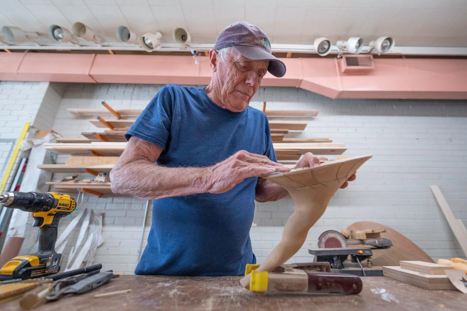 Joe Kronwitter works on a project in his workshop on Wednesday, May 8. Kronwitter will be recognized for designing the 2024 Governor's Creative Leadership Awards.
