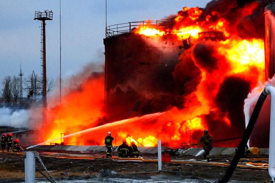 Firefighters battle the aftermath of a Russian strike on a fuel storage facility in Lviv (Ukrainian State Emergency Service/AFP/Getty)