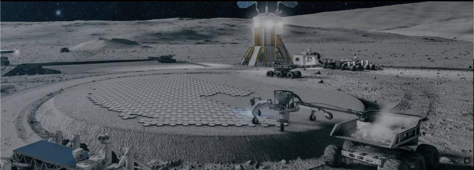 a base full of buildings and solar panels on the gray, dusty surface of the moon