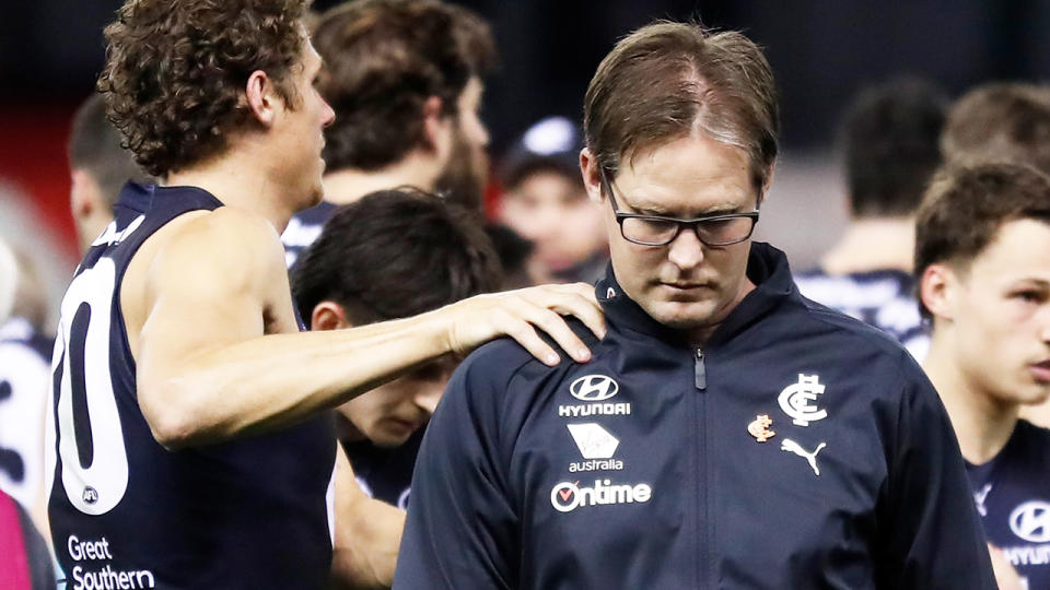 David Teague, pictured here being consoled by Charlie Curnow during Carlton's clash with GWS. 