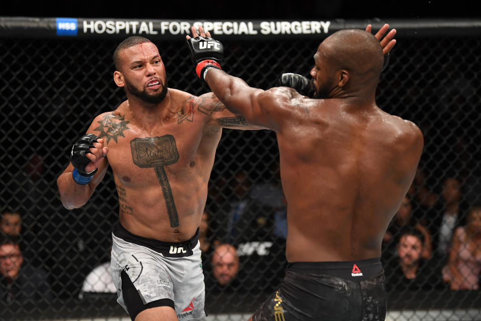 LAS VEGAS, NV - JULY 06:  Thiago Silva of Brazil punches Jon Jones in their UFC light heavyweight championship fight during the UFC 239 event at T-Mobile Arena on July 6, 2019 in Las Vegas, Nevada.  (Photo by Josh Hedges/Zuffa LLC/Zuffa LLC)