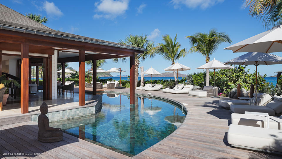 The pool is ringed with loungers. - Credit: Photo: Laurent Benoit for St. Barth Sotheby’s International Realty