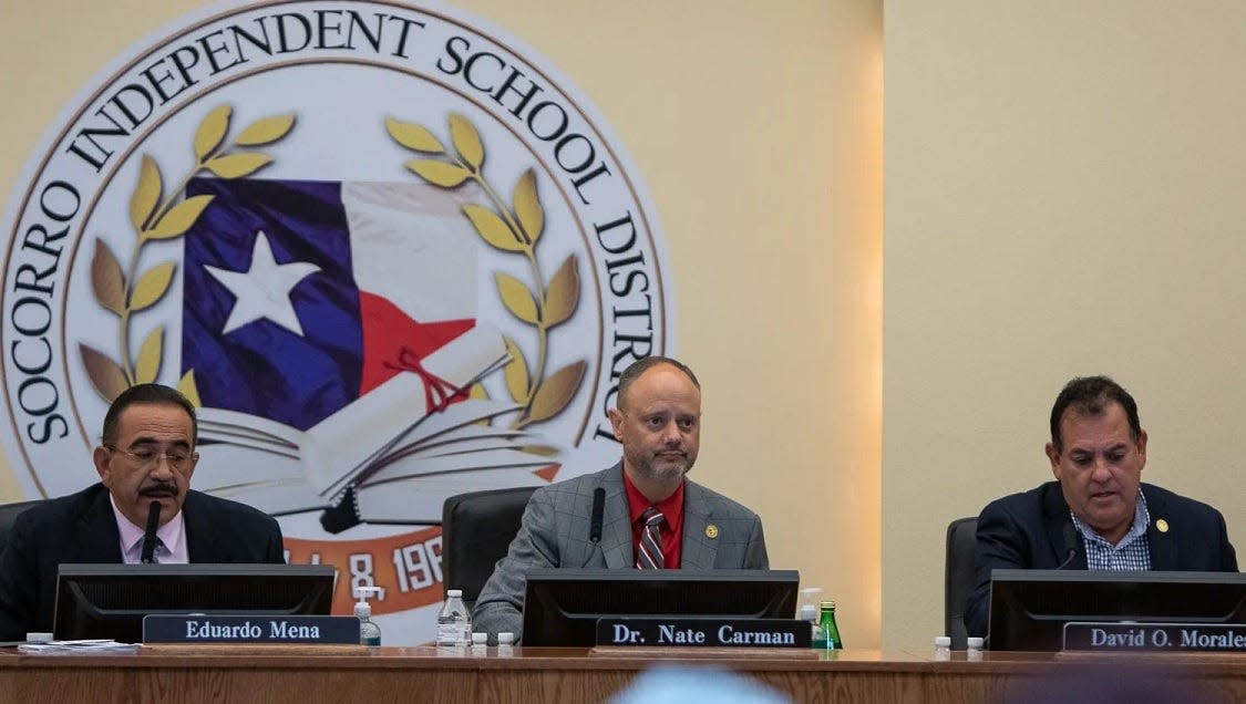 Socorro Independent School District Superintendent Nate Carman, center, attends a special meeting on June 7.
